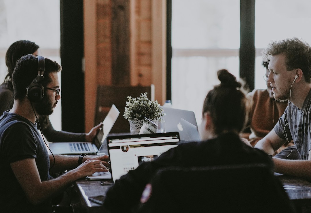 Marketing team analyzing social media sentiment and engagement data
