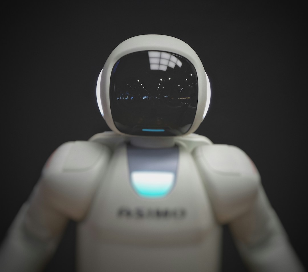 Marketing team collaborating with AI-powered tools on multiple screens